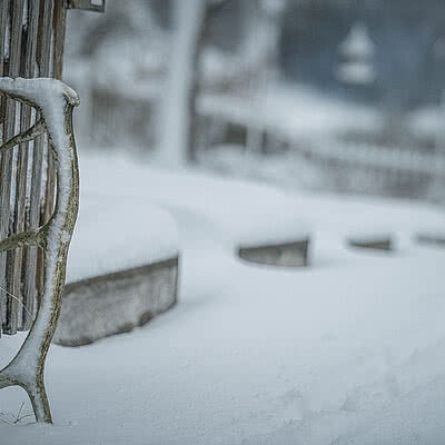 Snow-covered winter landscape at Das Bachmanngut, Wolfgangsee